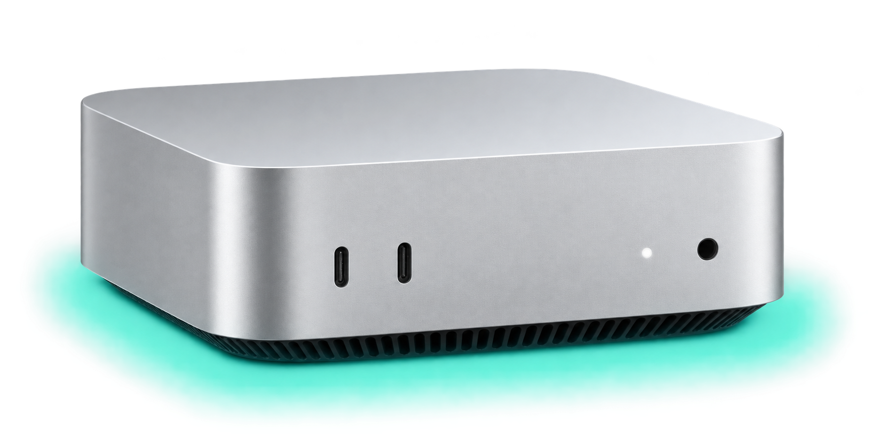 A silver Mac mini with two front USB-C ports, a status light, and a headphone jack, illuminated by a restrained mint-teal underglow